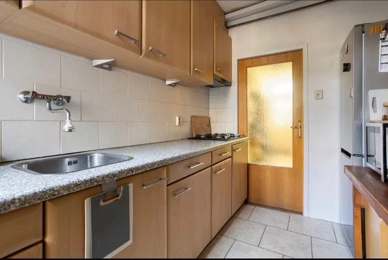 Before: Kitchen with the steel column on show